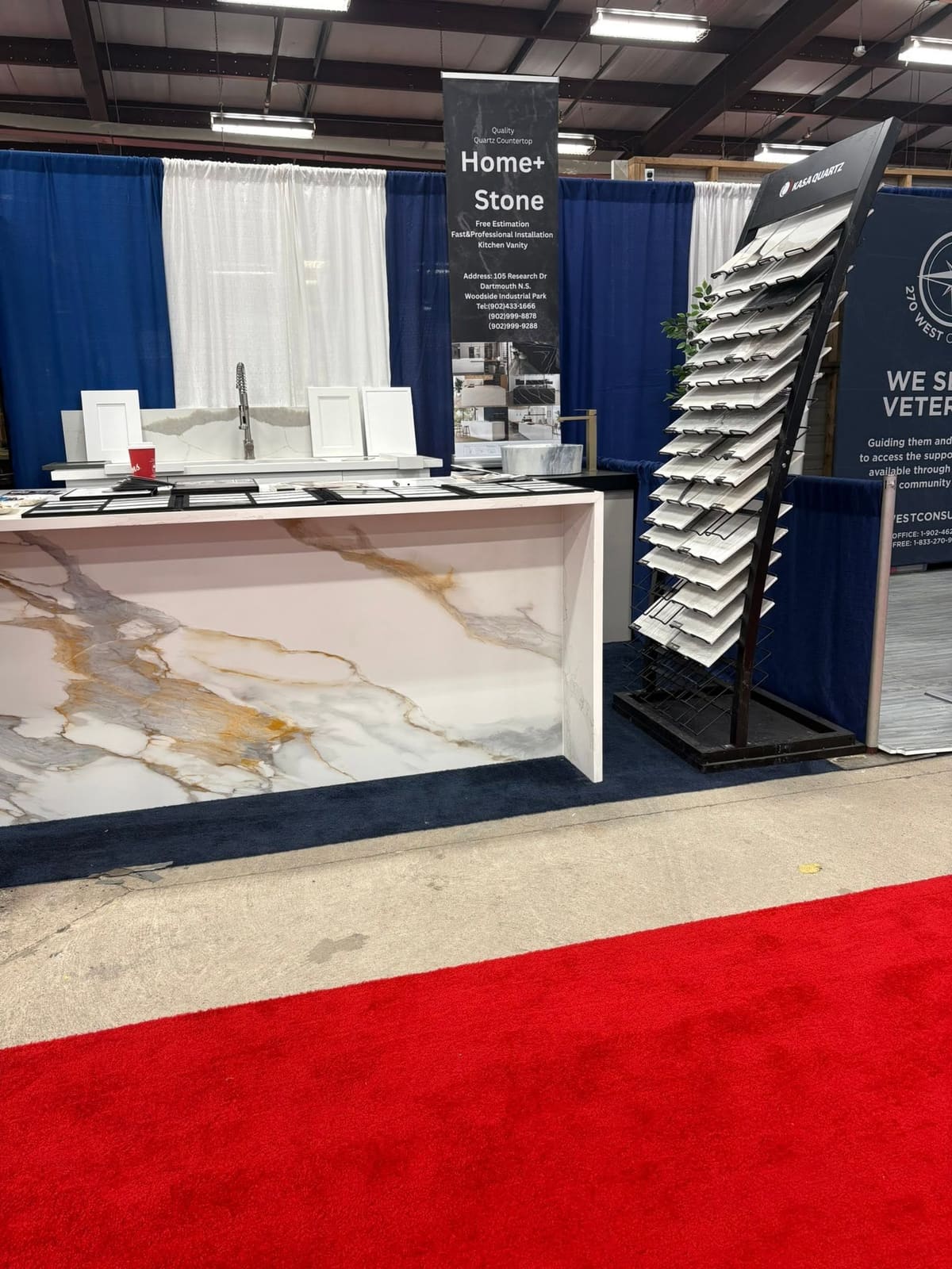HomePlus Stone display counter and sample racks at a Nova Scotia home show